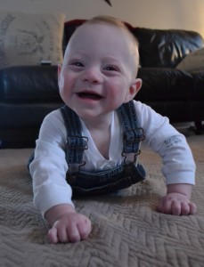 Overalls and a smile. All a boy needs.